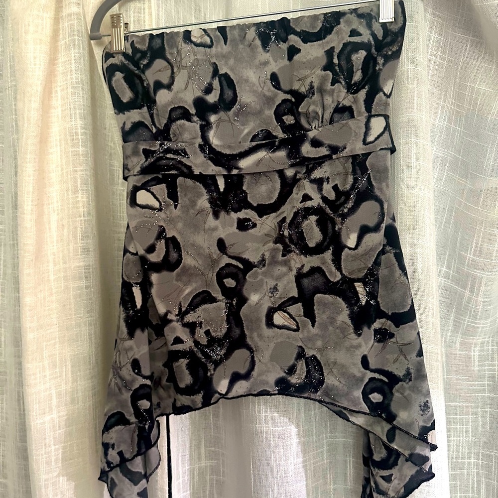 Beautiful blouse dressy but can wear with anything size xl fits like a m/l